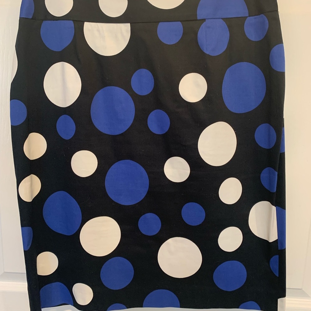 royal blue and white polka dots on black A-line skirt